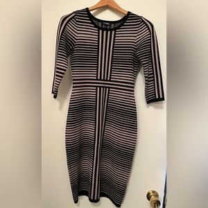 Striped sweater dress with 3/4 length sleeves. Size XS.